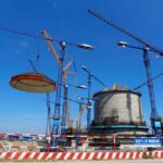 A dome is installed over a Hualong One nuclear reactor in China in 2018 -- the same type being exported to Pakistan. © China Daily via Reuters