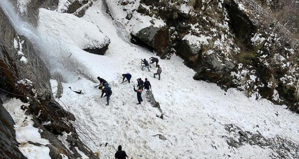 burying dozens under the snow.